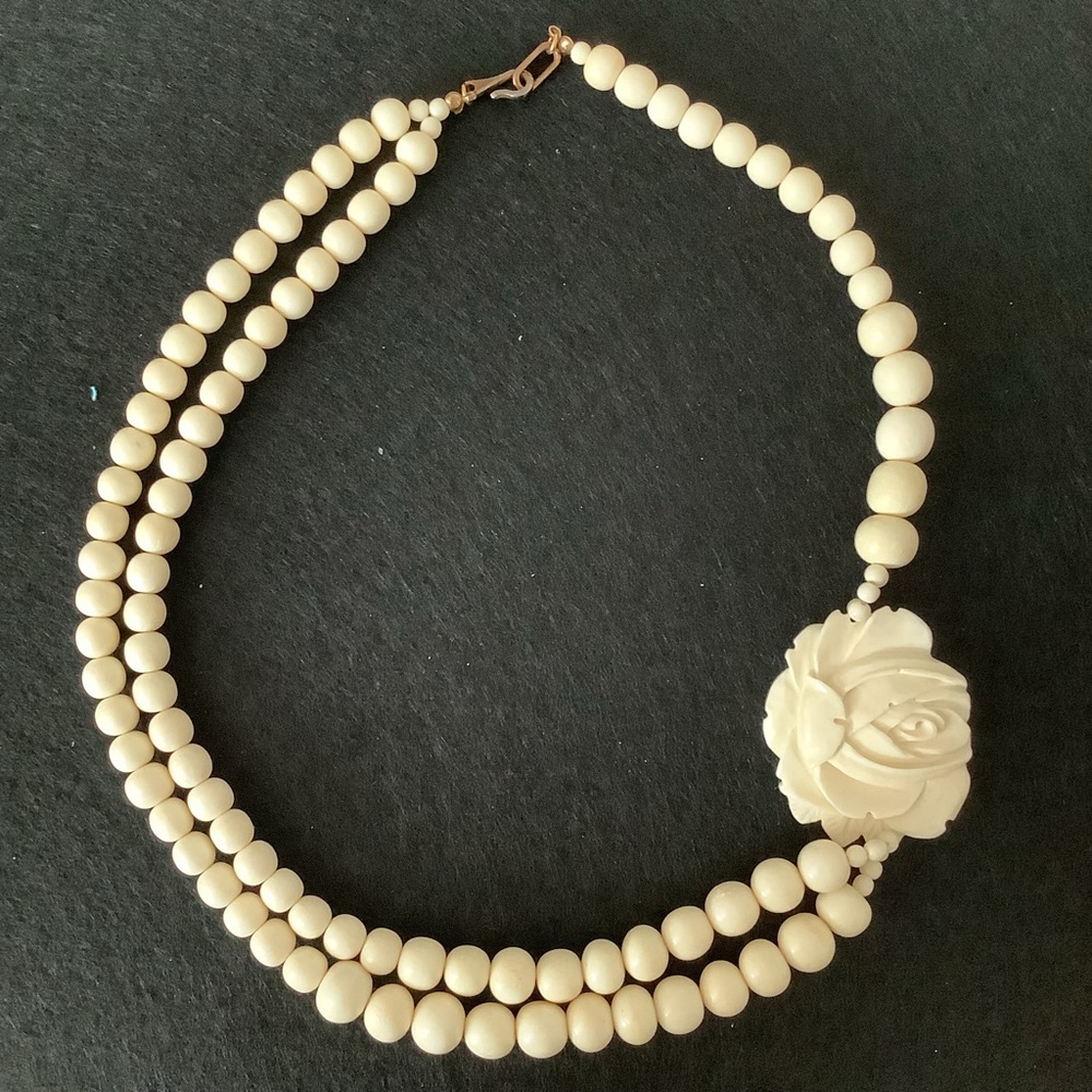 Vintage hand carved bone necklace.